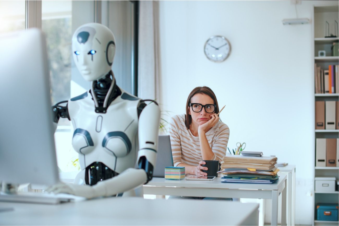 An AI employee handling the busywork at a desk